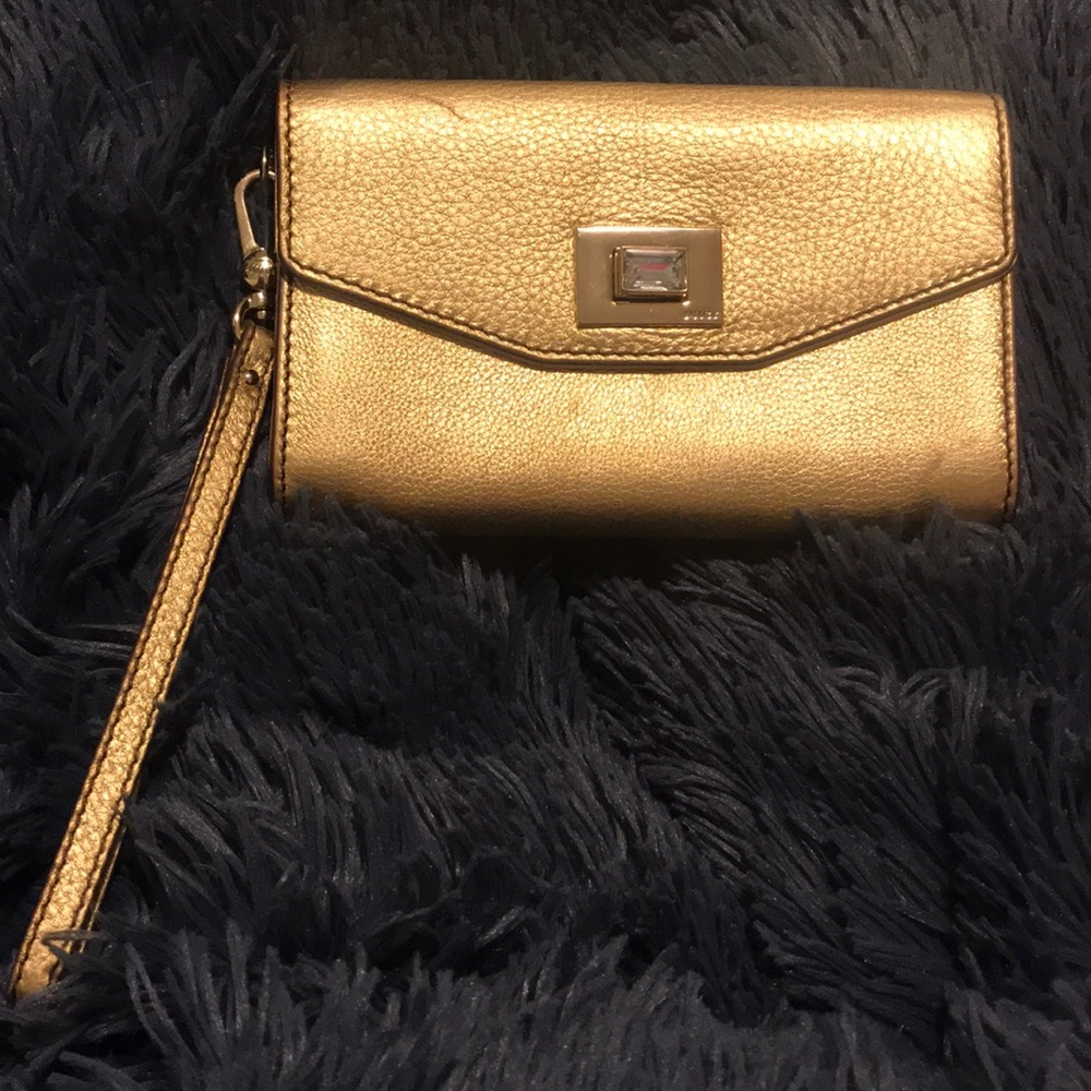 Gold Juicy Couture wristlet.